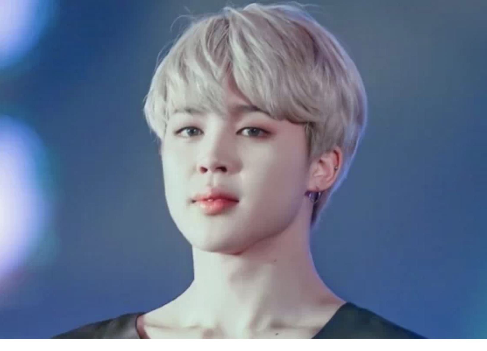 BTS member Jimin poses for a photo.